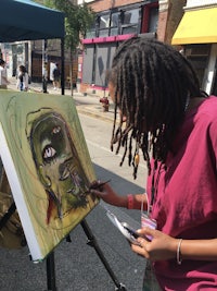 a woman with dreadlocks